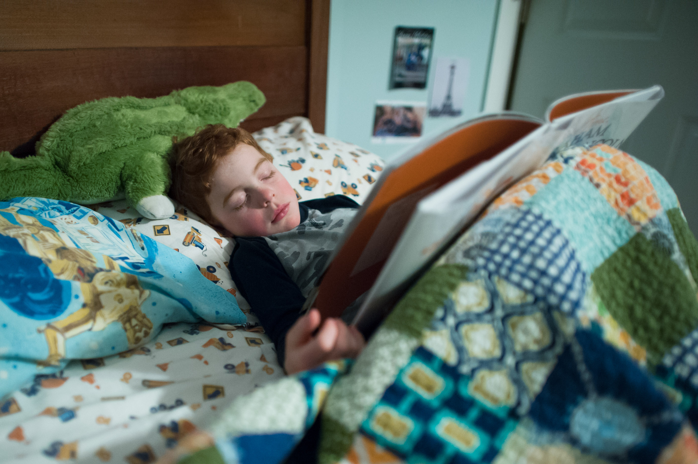 boy falls asleep while reading - Documentary Family Photography
