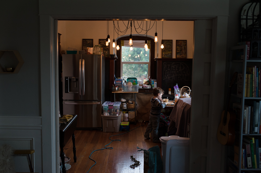 boy in dining space -Documentary Family Photography