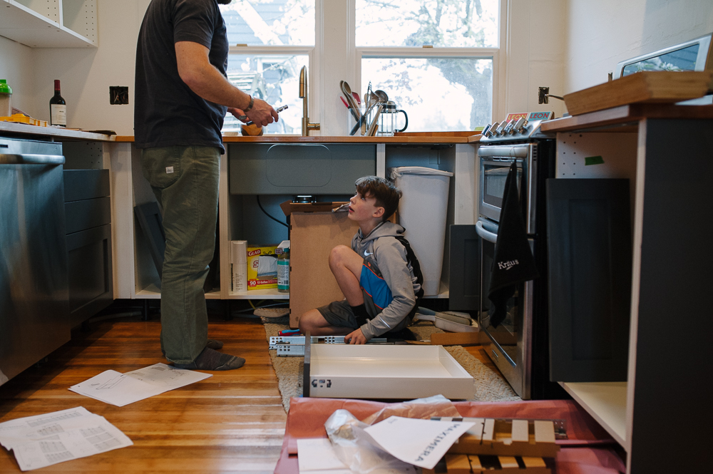 father and son with kitchen remodel - Documentary Family Photography