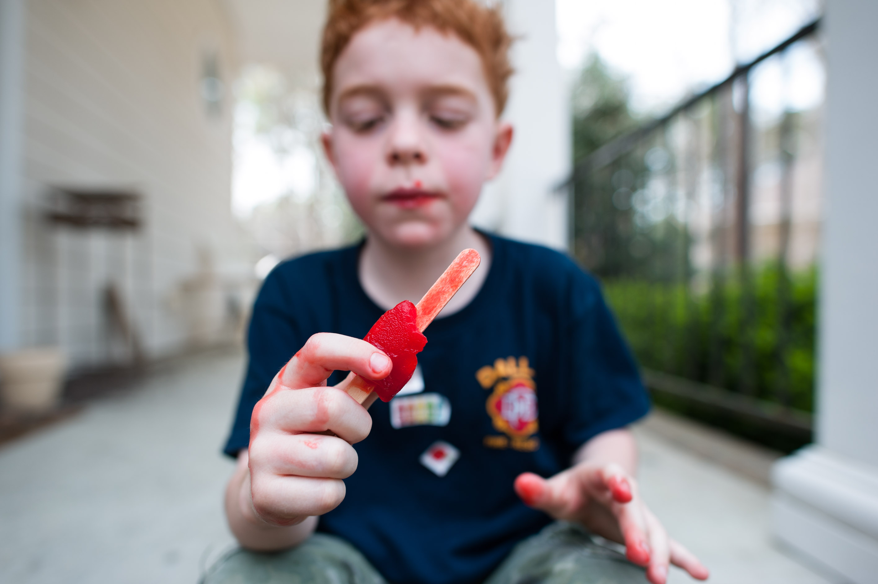 boy eating popsicle - Documentary Family Photography