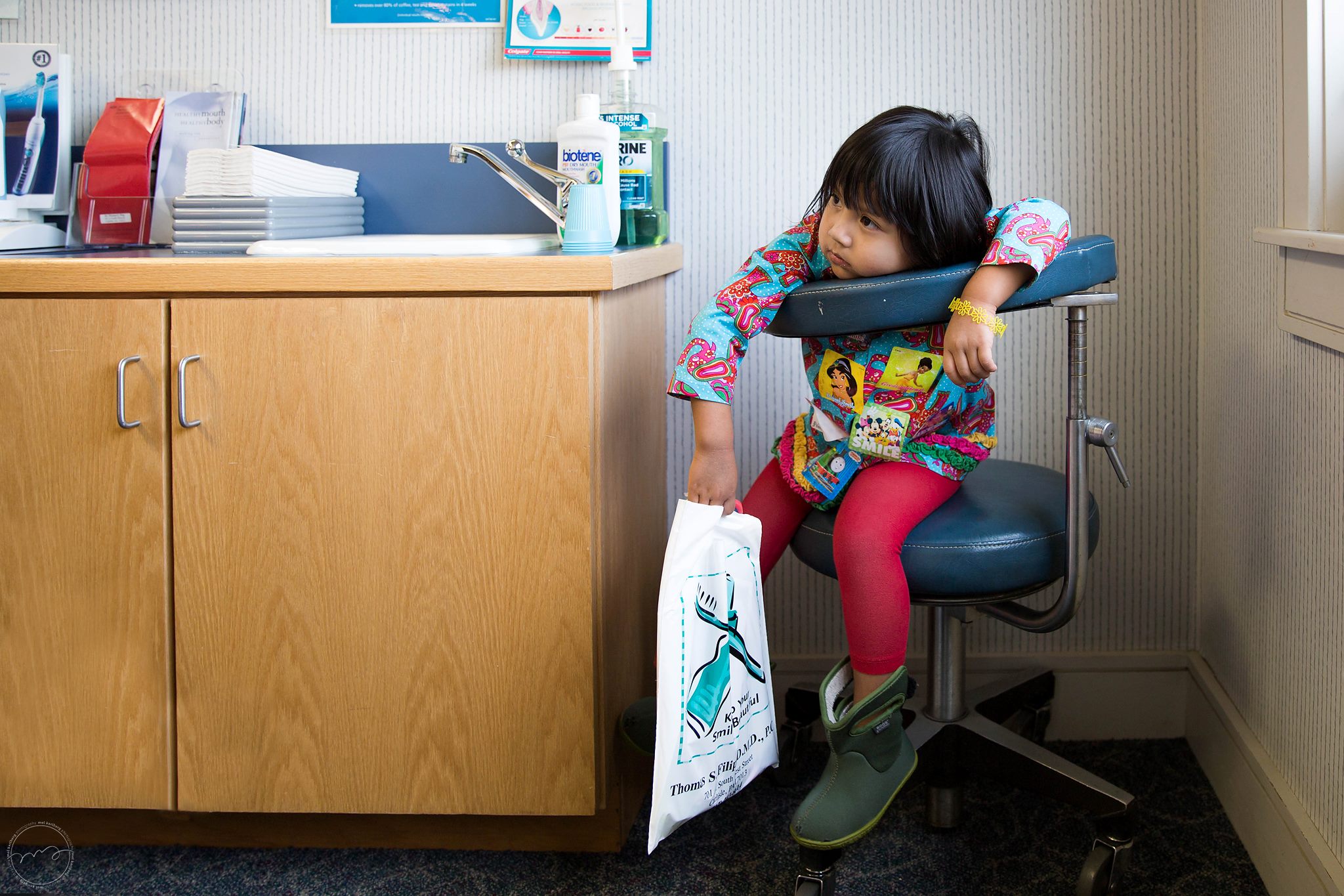 girl waits in dentist office - Documentary Family Photography