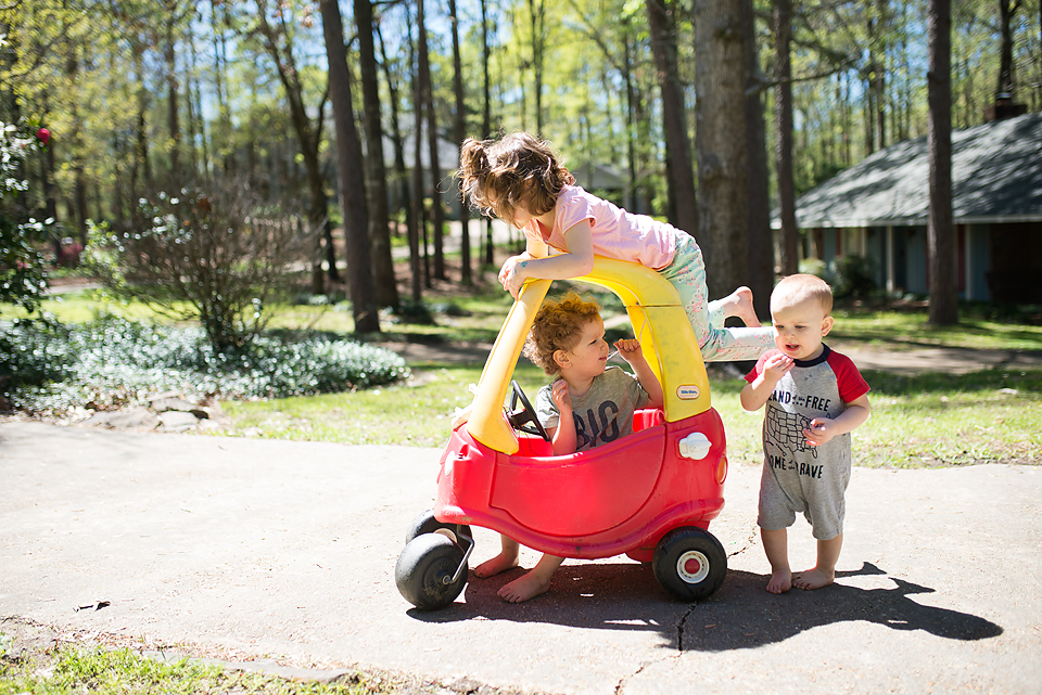 Kids playing with toy car - Documentary Family Photography