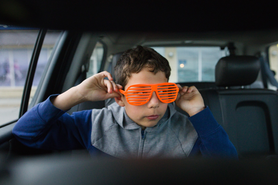 boy with novelty glasses - Documentary Family Photography