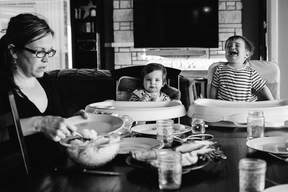 kids wait impatiently for dinner - Documentary Family Photography