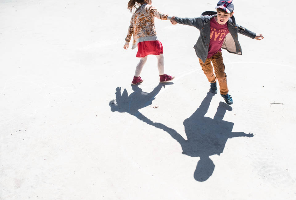 kids playing in sunlight - Documentary Family Photography