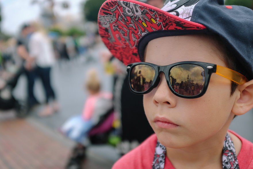 Child in hat and sunglasses - Documentary Family Photography