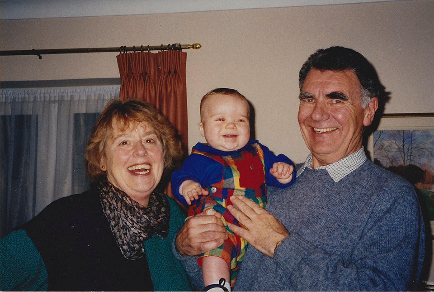 snapshot of grandparents with grandchild - Documentary Family Photography
