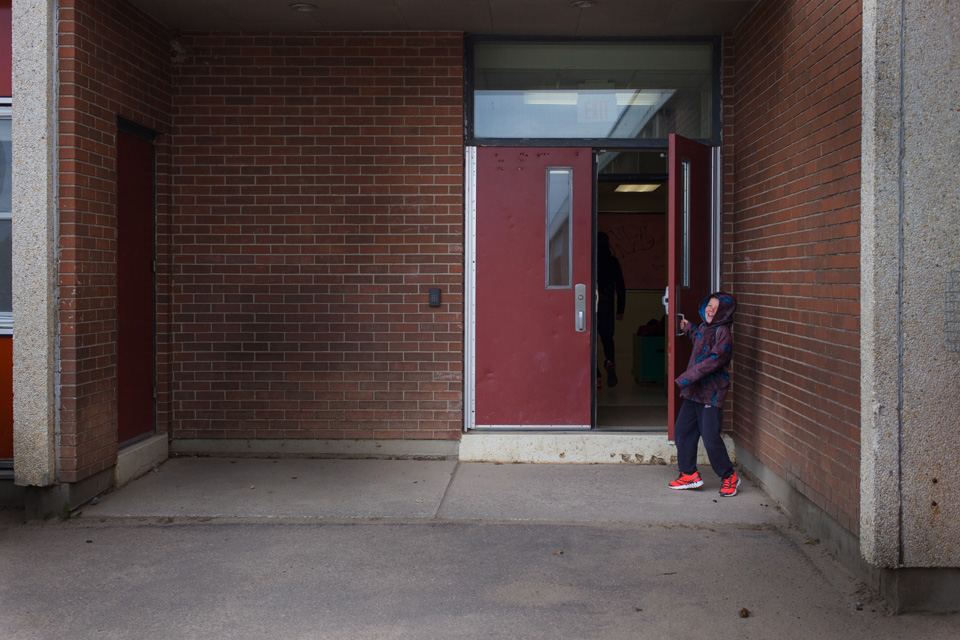 boy walks into school - Documentary Family Photography