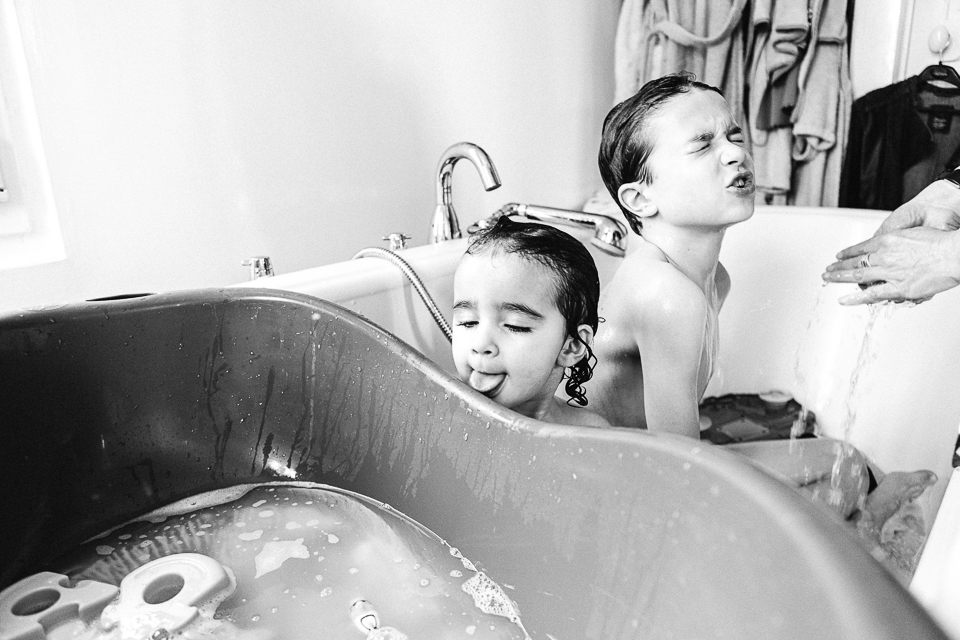 kids in large sink bath - documentary family photography