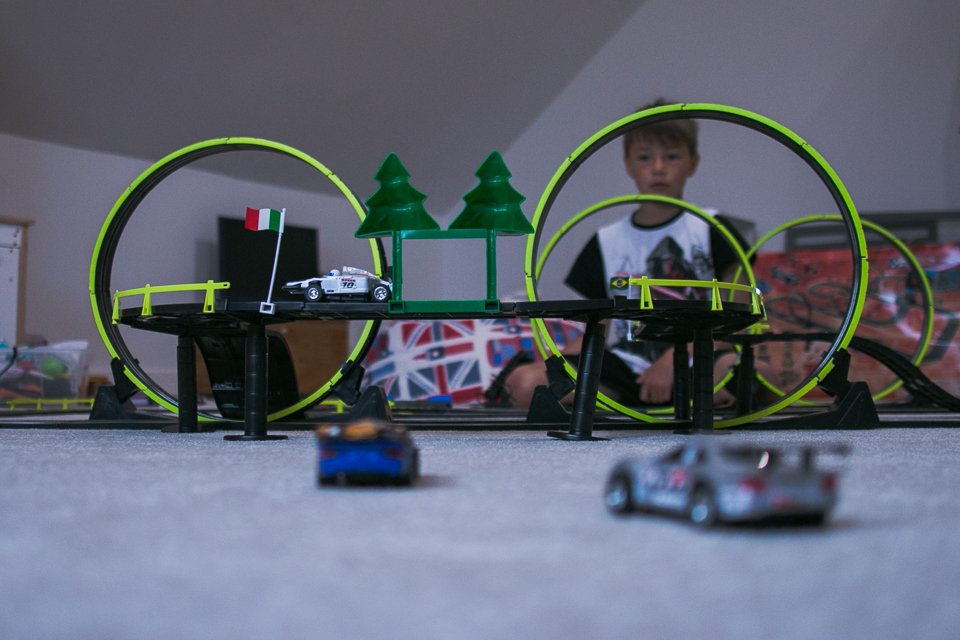 boy with racetrack - Documentary Family Photography