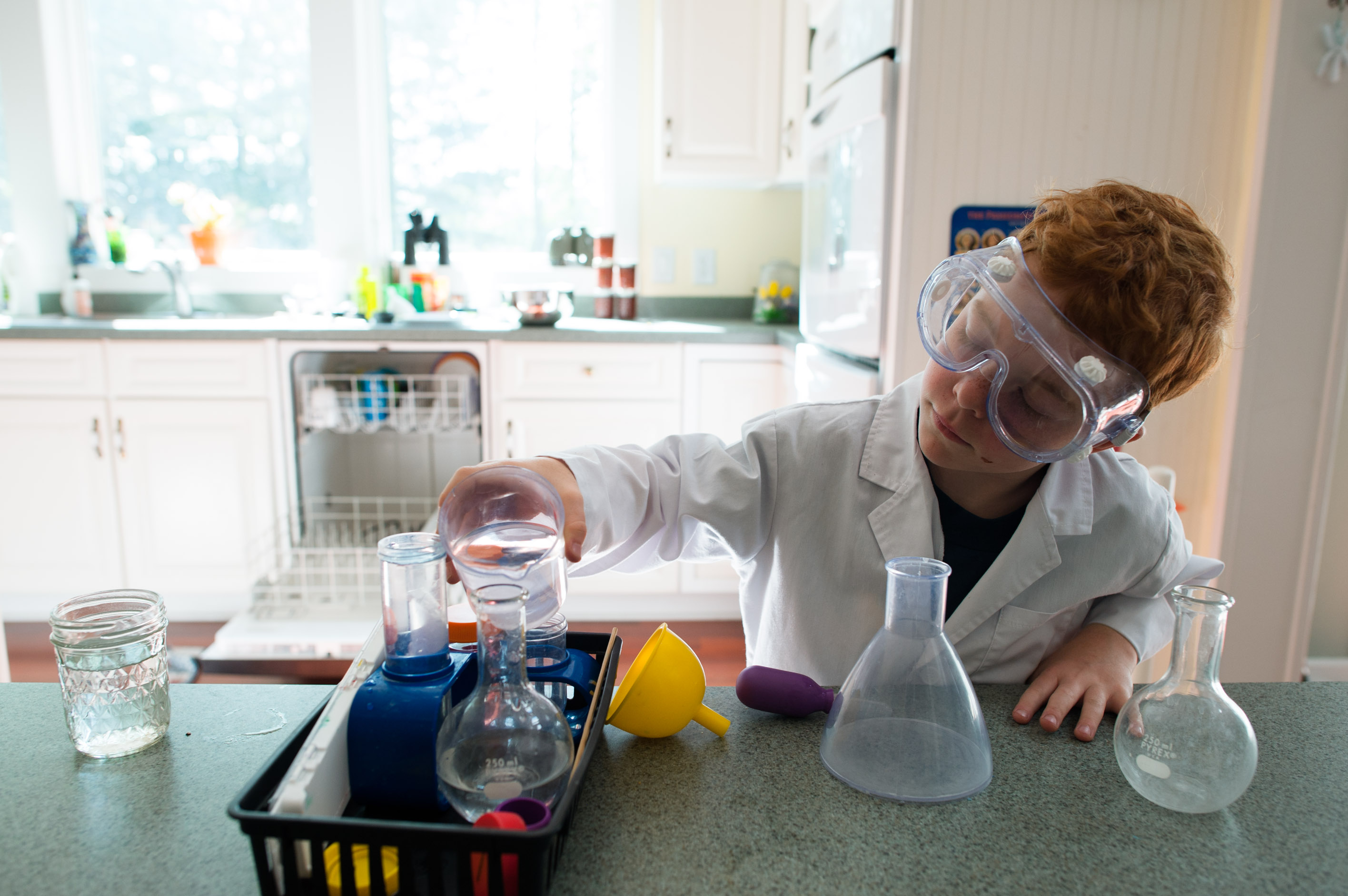 boy with chemistry set - Documentary Family Photography