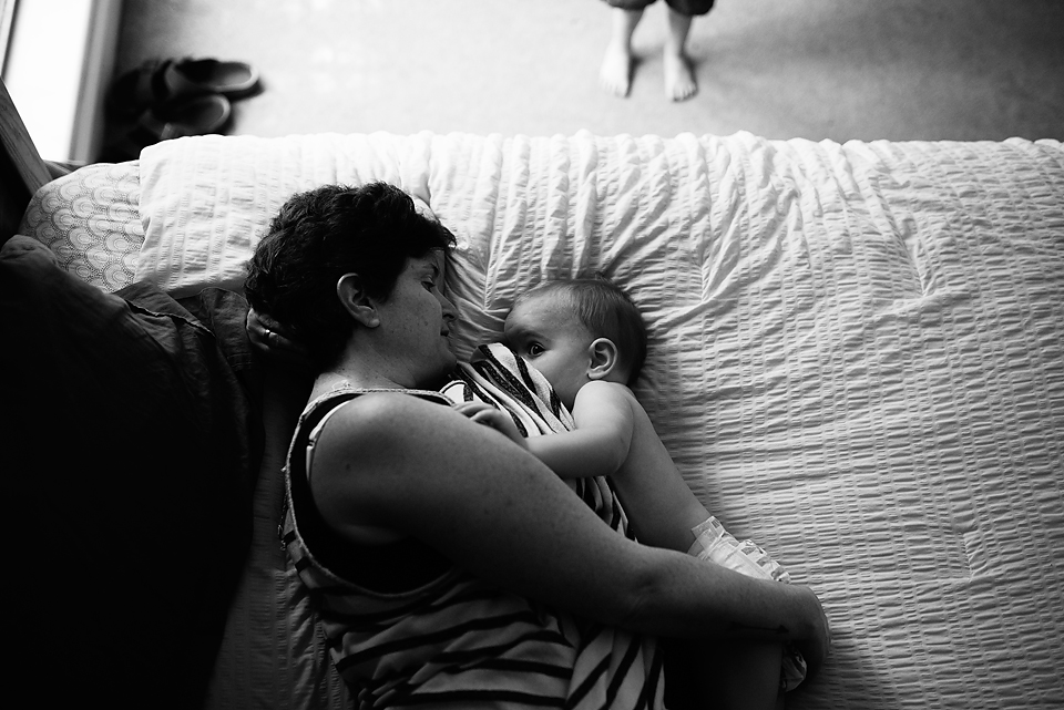 Mom with nursing baby - Documentary Family Photography