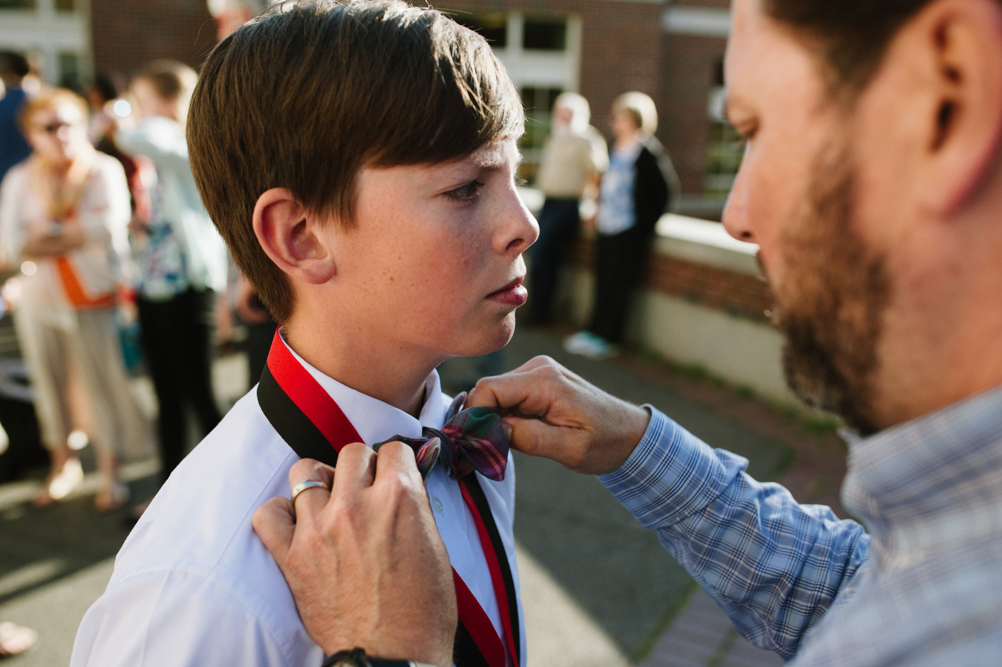 Dad ties son's bow tie - Documentary Family Photography