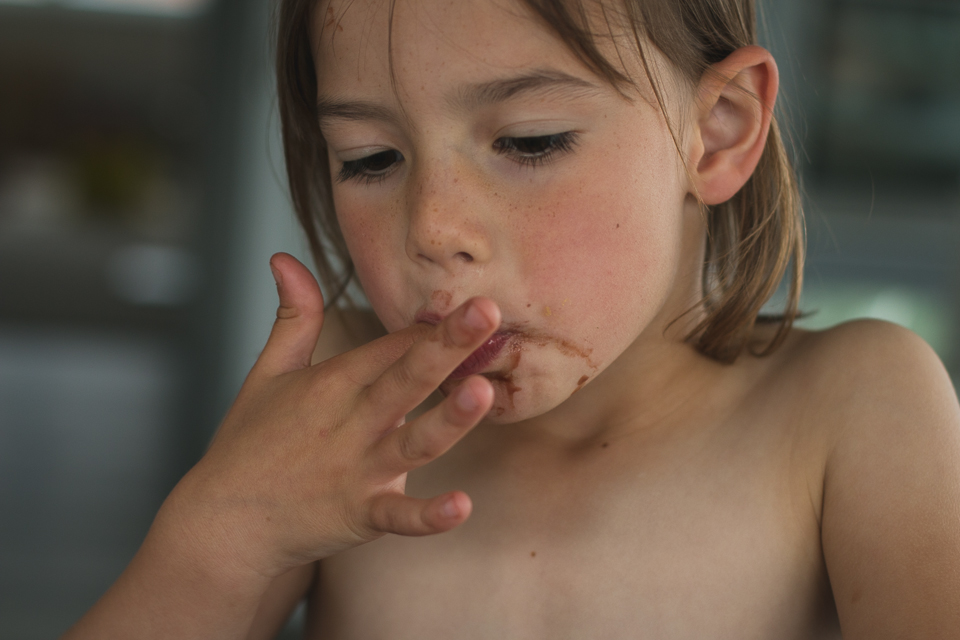 child sucking on finger - Documentary Family Photography