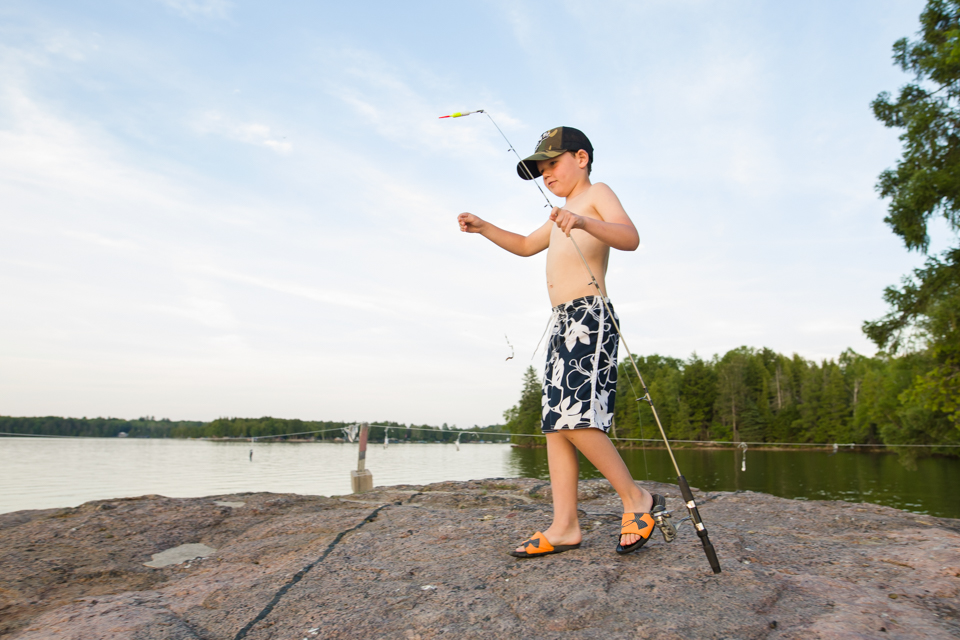 boy with fishing pole - Documentary Family Photography