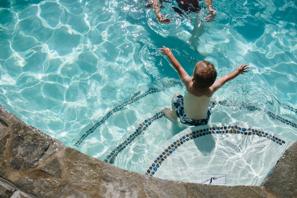 child in pool - Documentary Family Photography