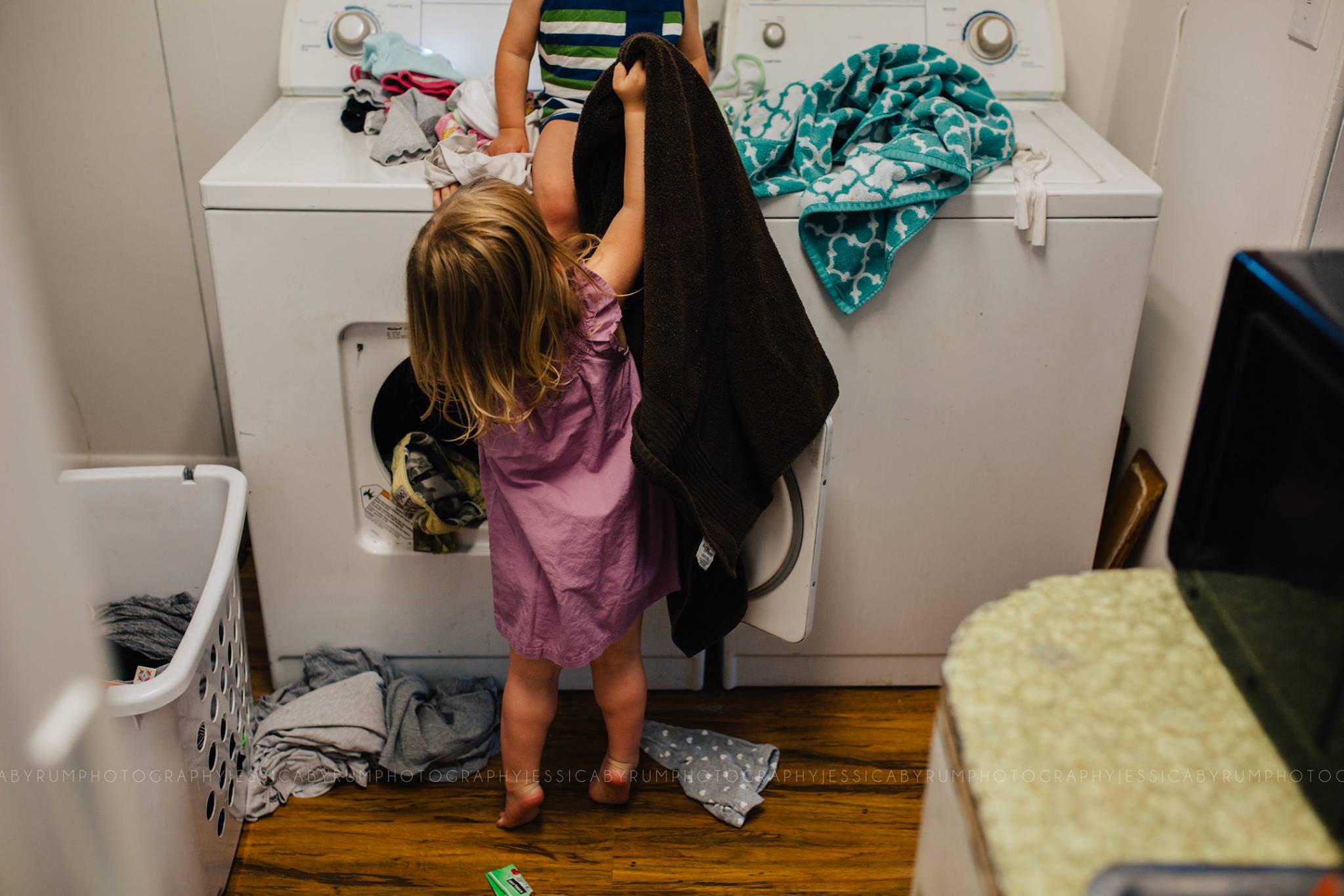 girl with laundry - Documentary Family Photography