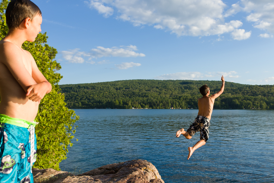 boys jumping into lake -Documentary Family Photography
