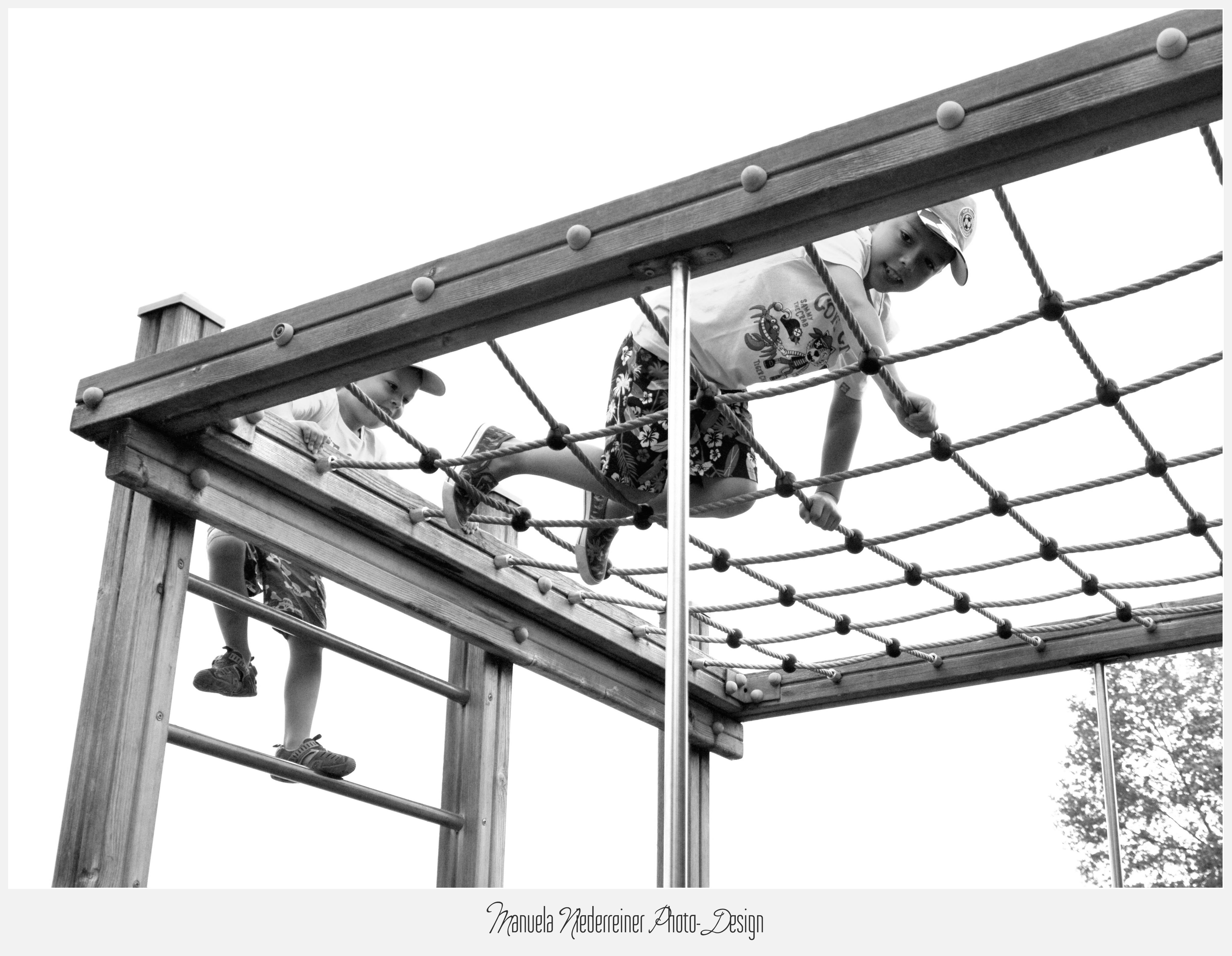 Boys on Jungle Gym - documentary family photography