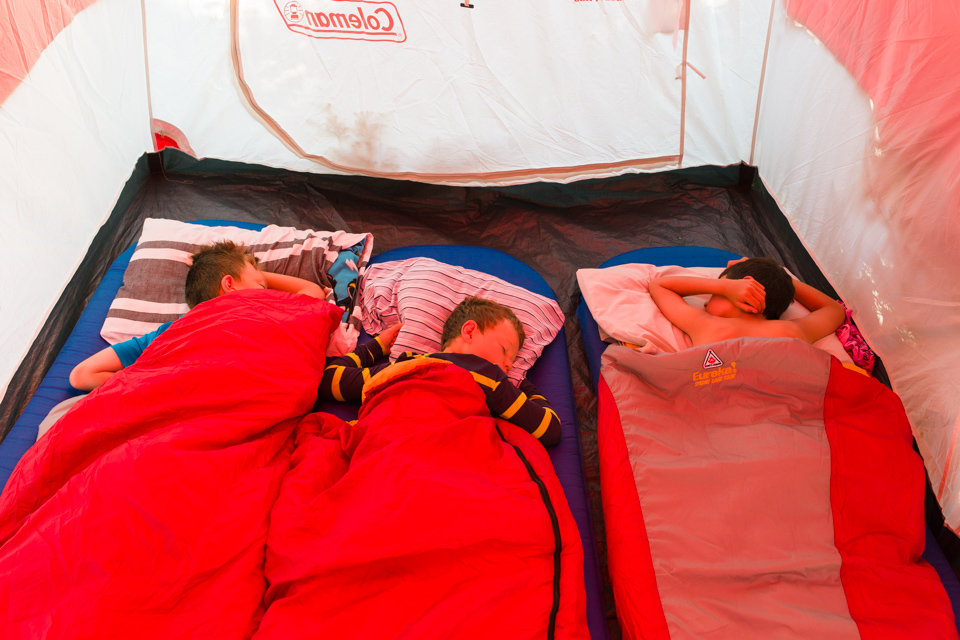 boys in sleeping bag in tent - Documentary Family Photography