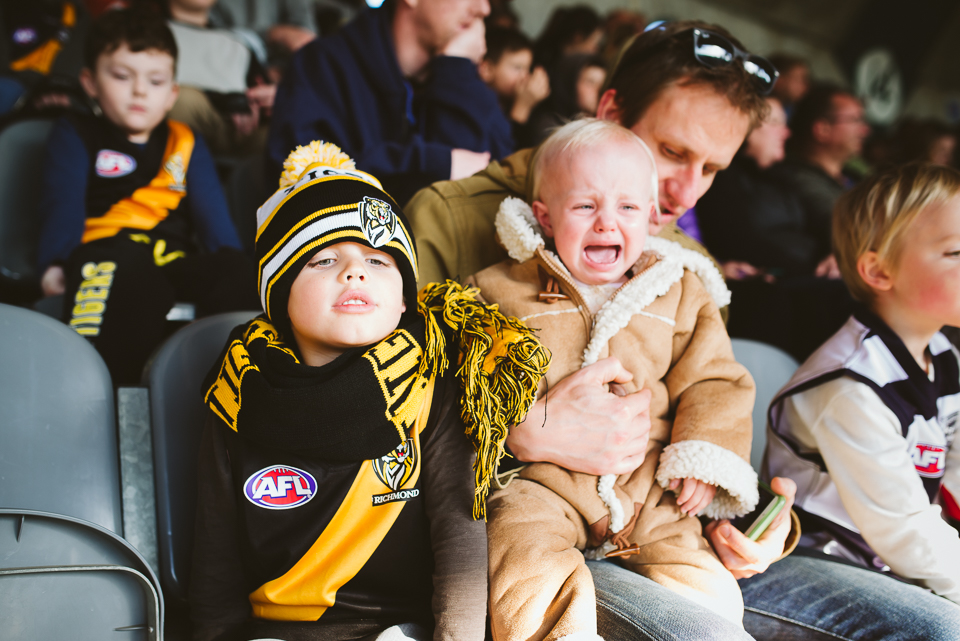 Angry child at sporting event - Documentary Family Photography