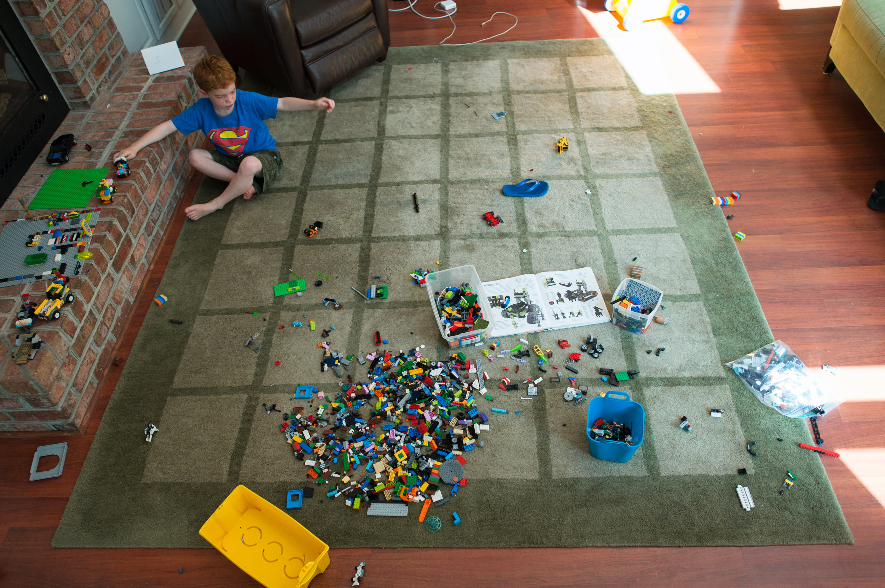 boy with legos on floor - Documentary Family Photography