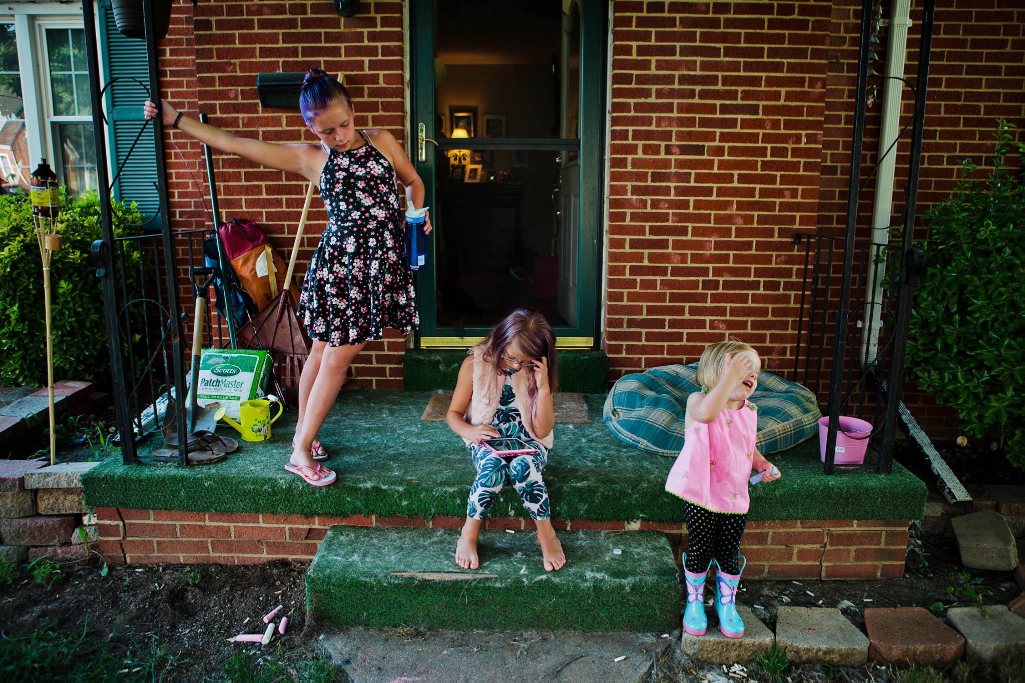 kids playing on porch - Documentary Family Photography