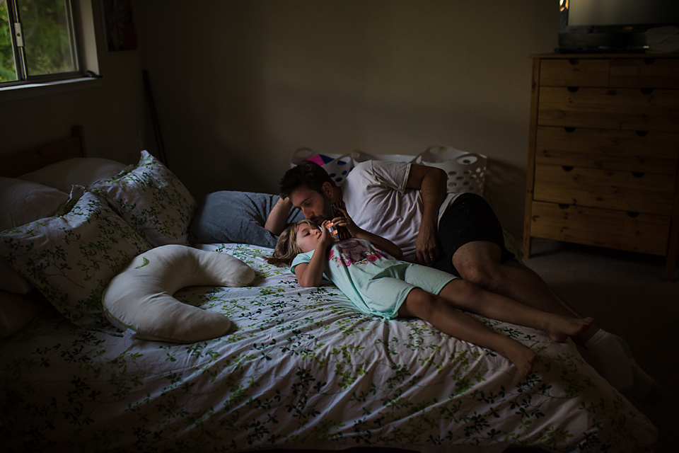 Father and Daughter on bed - Documentary Family Photography.