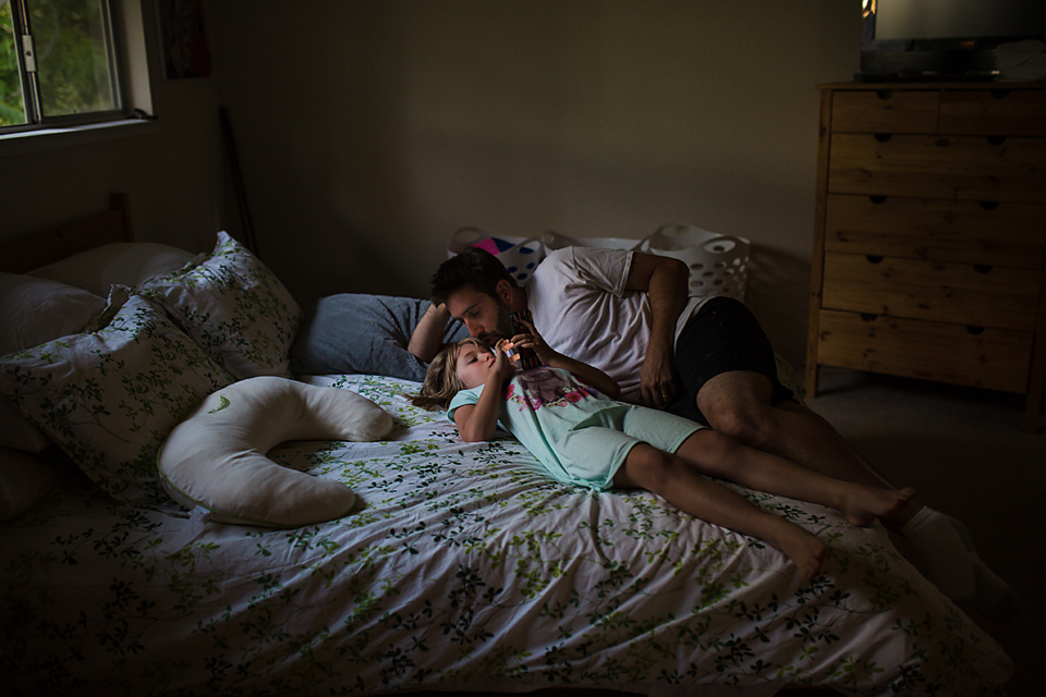 Father and Daughter on bed - Documentary Family Photography