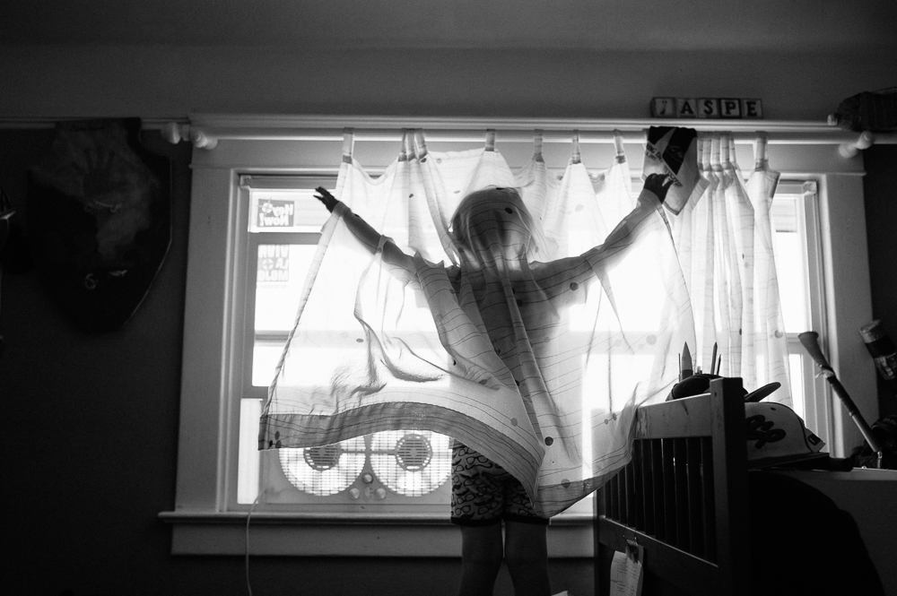 person under window sheers - Documentary Family Photography