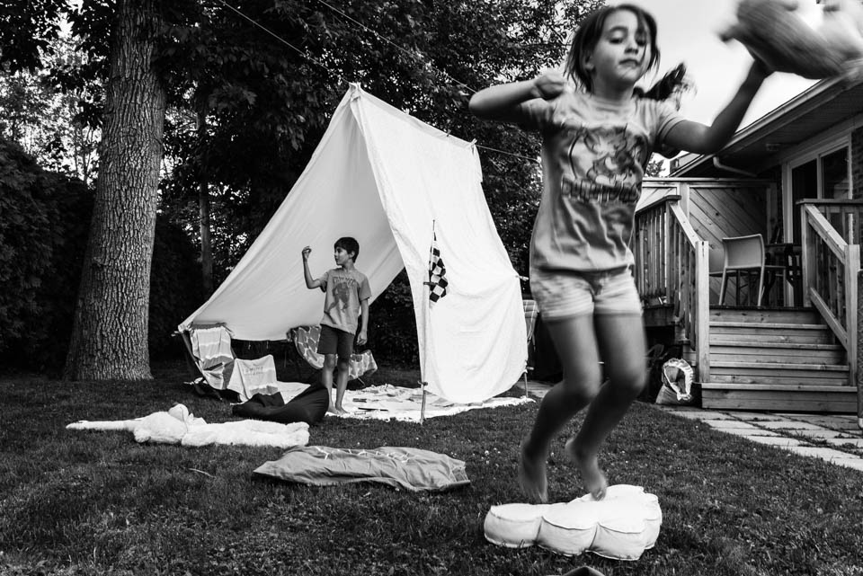 kids play at backyard campsite - Documentary Family Photography
