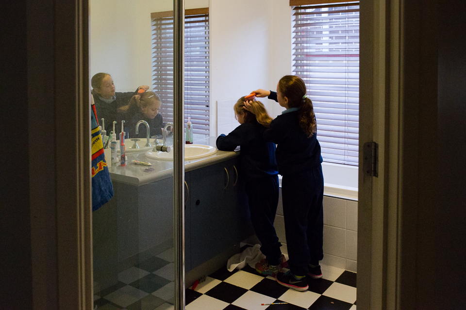 Girls do each other's hair - Documentary Family Photography