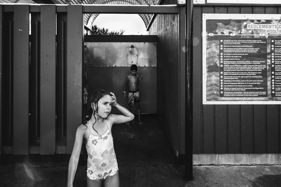 kids in pool shower -Documentary Family Photography