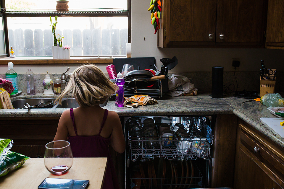 girl unloads dishwasher - Documentary Family Photography