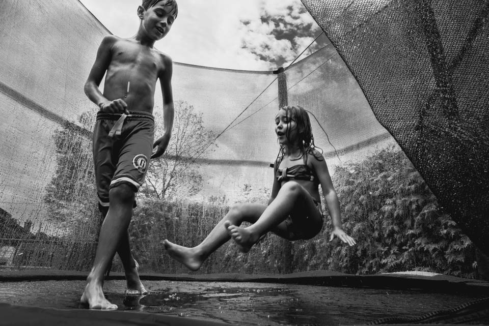 kids on trampoline - Documentary Family Photography