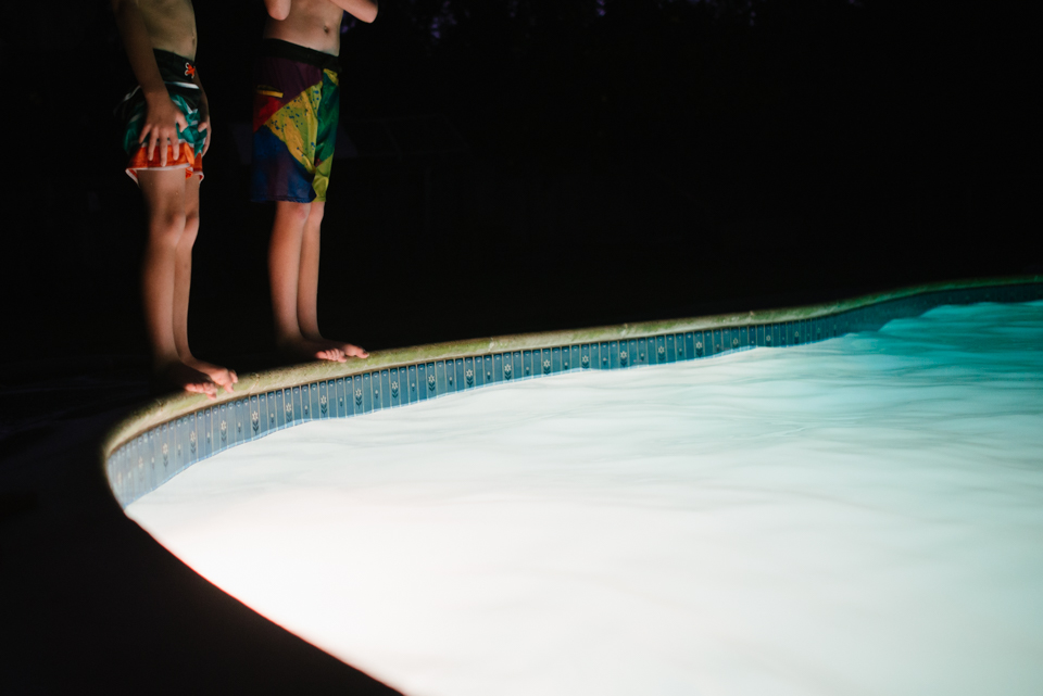 boys standing at edge of pool - Documentary Family Photography