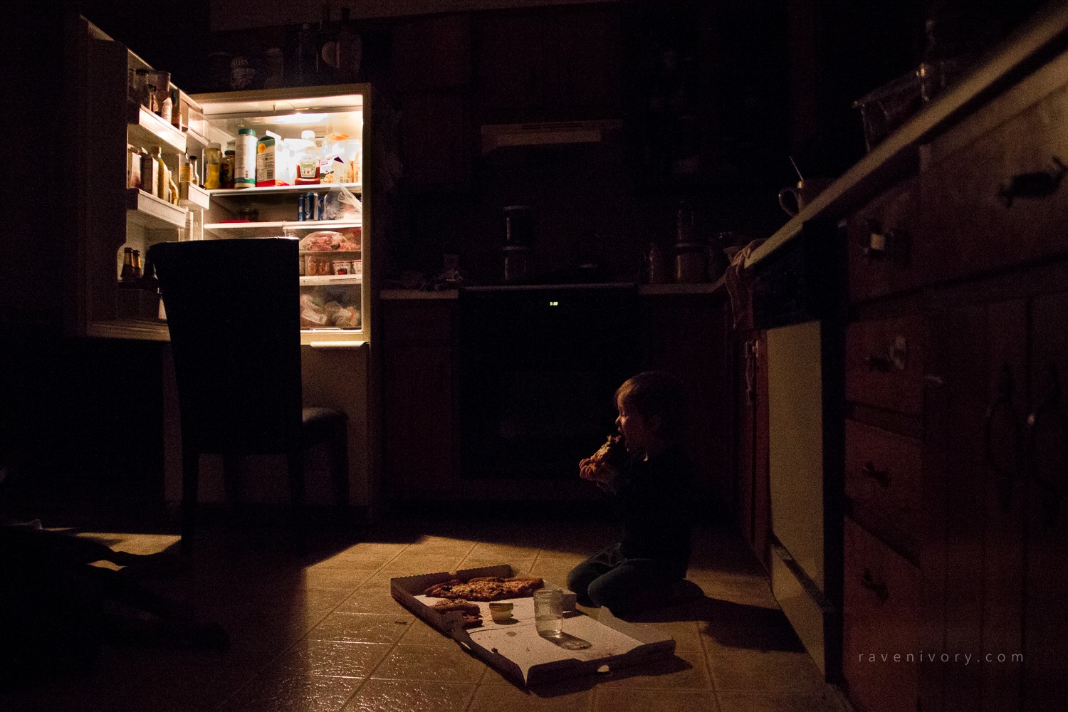 child eats late night pizza - Documentary Family Photography