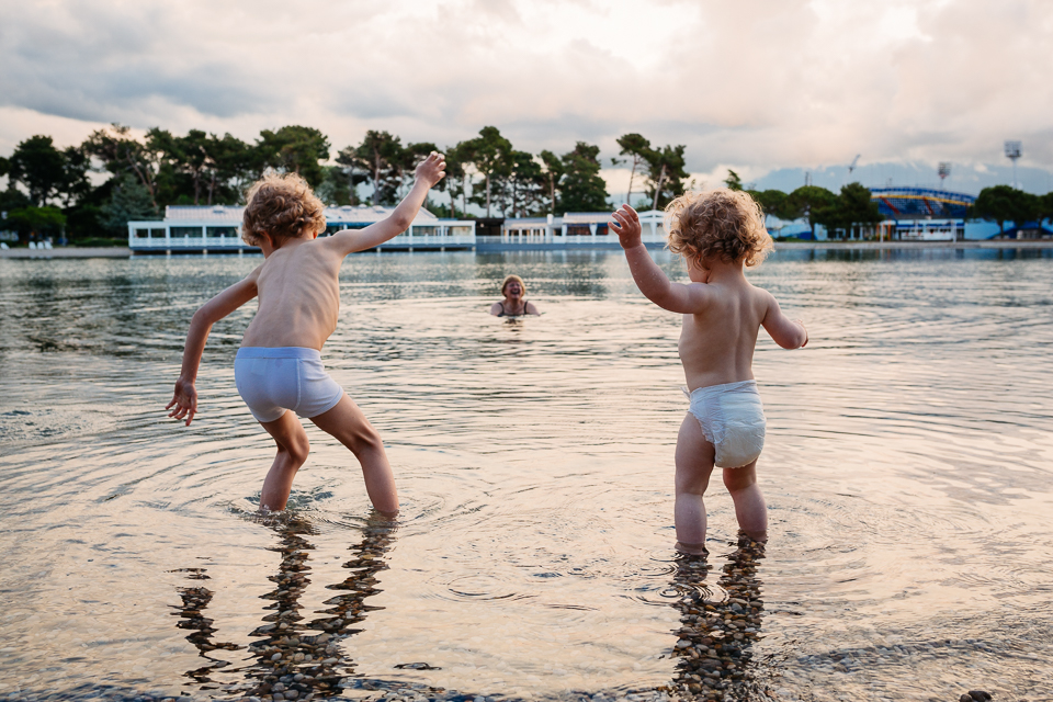 kids dance on shore - Documentary Family Photography