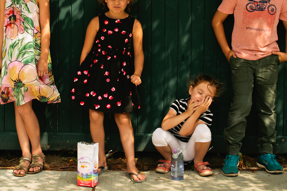 girl waiting in line - Documentary Family Photography