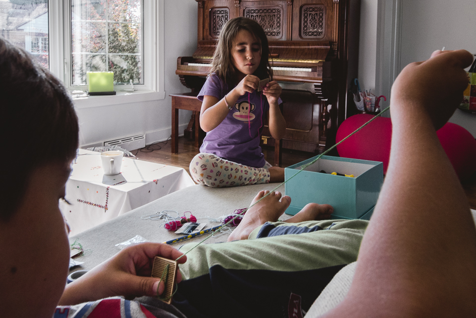 children with lacing toys - Documentary Family Photography