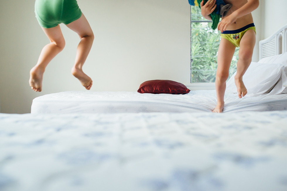 kids jumping on bed - Documentary Family Photography