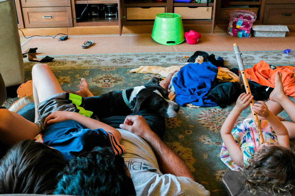 kids lounging in living room - Documentary Family Photogarphy