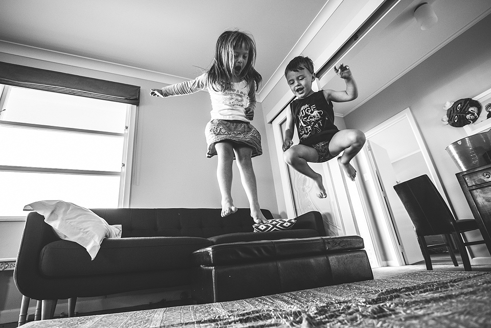 kids jumping on couch