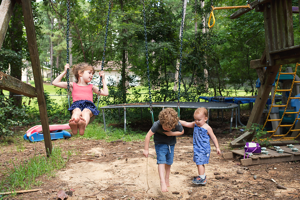 kids playing on swings - Documentary Family Photography