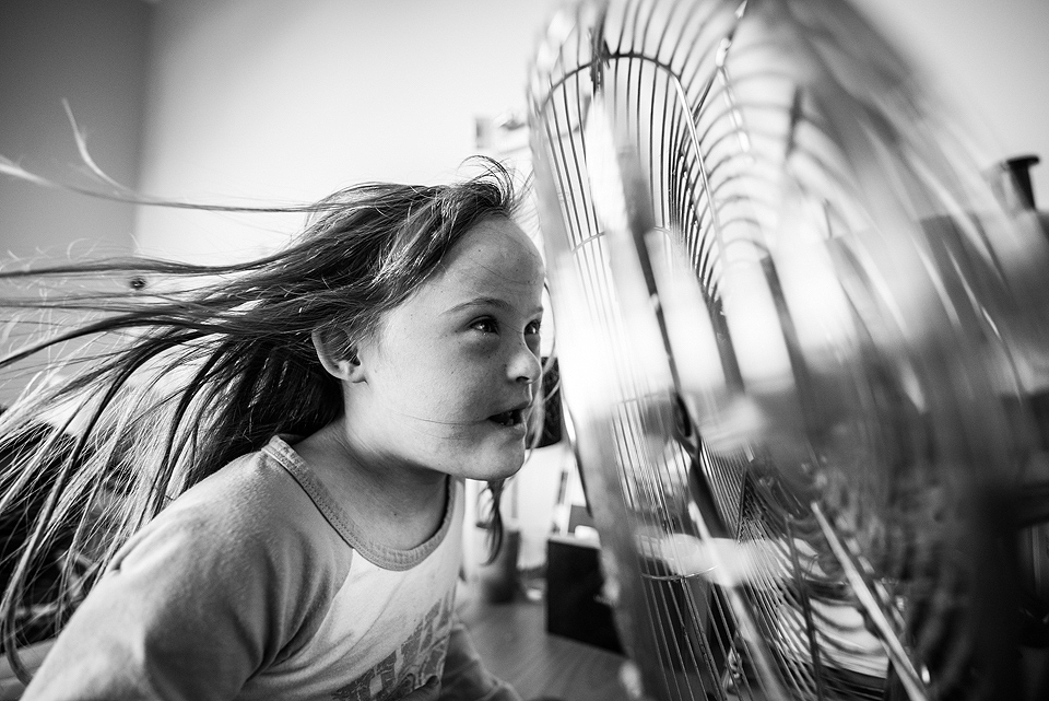 girl at fan - Documentary Family Photography