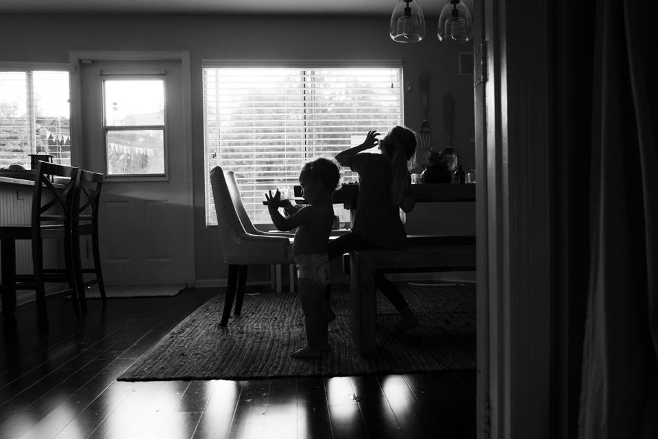 silhouette of kids in living room - Documentary Family Photography