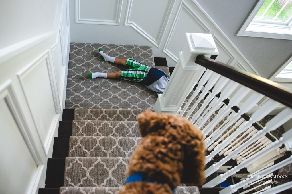 boy asleep on stairs - Documentary Family Photography