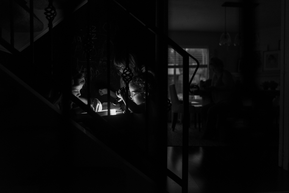 kids working in dark room - Documentary Family Photography