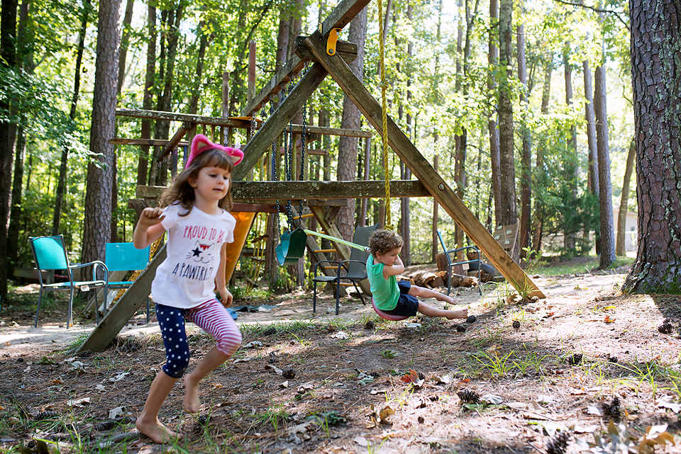 children playing on swing set - Documentary Family Photography