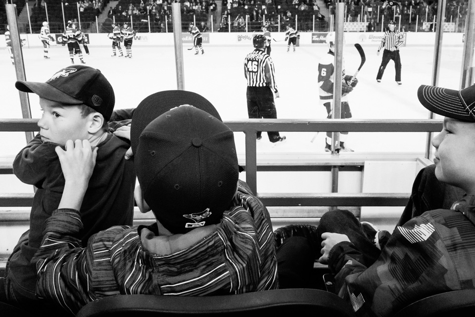 kids at hockey game - Documentary Family Photography
